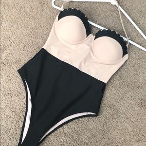 One piece color block swimsuit. Never before worn.